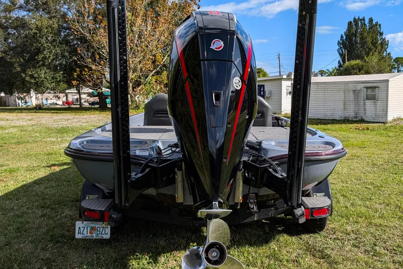 Slide: The Image of 2023 Falcon F195 boat interior with dual seats, steering wheel, and Humminbird display. - 8