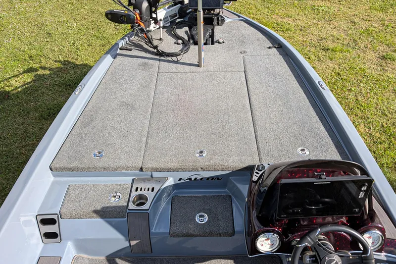 Slide: The Image of 2023 Falcon F195 boat interior with dual seats and steering wheel. - 9