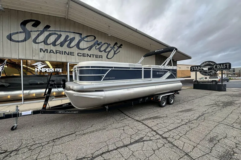 Slide: The Image of 2026 Godfrey SWEETWATER 2286 CSE pontoon boat at Stancraft Marine Center. - 2