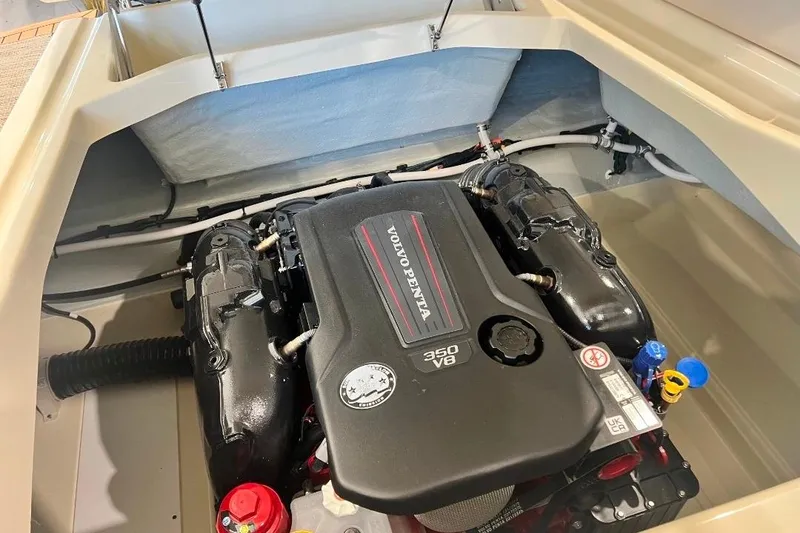 Slide: The Image of 2025 Chris-Craft Sportster 25 engine compartment with Volvo Penta 350 V8 engine. - 13