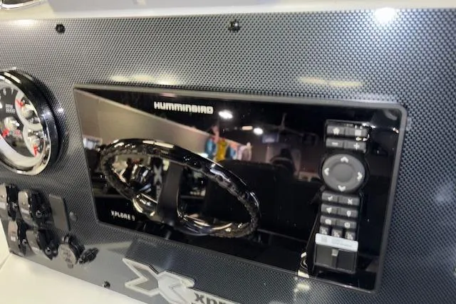 Slide: The Image of Dashboard of 2026 Xpress H20B Bay boat with Humminbird electronics. - 14