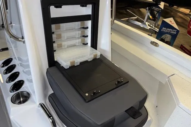 Slide: The Image of 2026 Xpress H20B Bay boat with organized tackle storage and seating. - 17