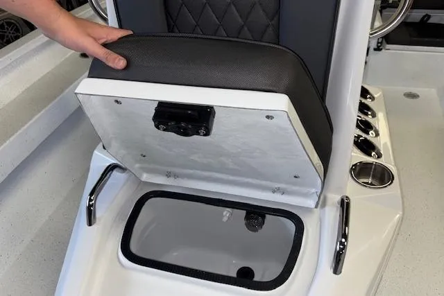 Slide: The Image of 2026 Xpress H20B Bay boat seat with storage compartment open. - 18