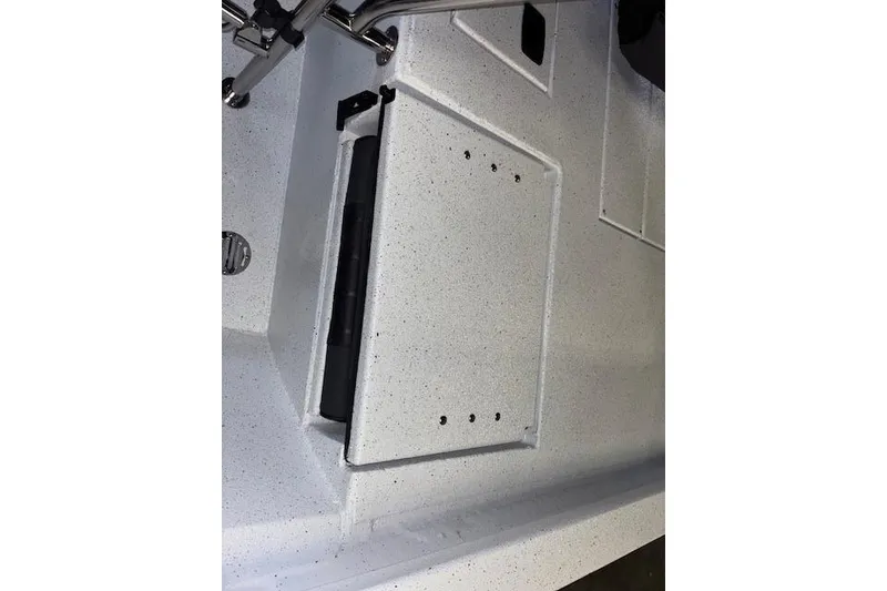 Slide: The Image of 2026 Xpress H20B Bay boat interior with storage compartment and speckled finish. - 25