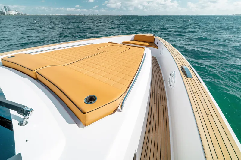 Slide: The Image of 2023 Pardo Yachts 50 with luxurious deck and sunbathing area on open sea. - 14