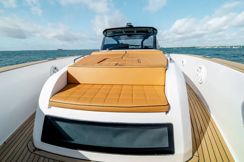Slide: The Image of 2023 Pardo Yachts 50 luxury deck with tan seating, ocean view. - 15
