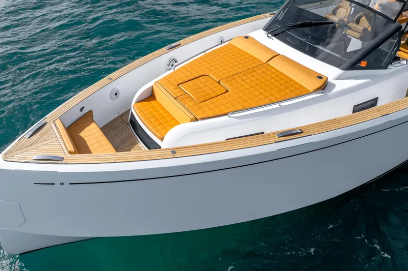 Slide: The Image of 2023 Pardo Yachts 50 with sleek design and luxurious deck on blue water. - 5