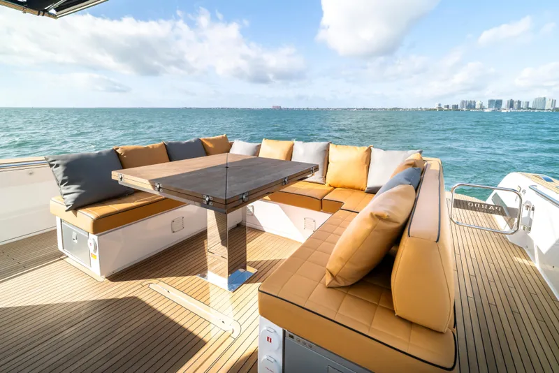 Slide: The Image of Luxurious seating area on 2023 Pardo Yachts 50, overlooking serene ocean view. - 7