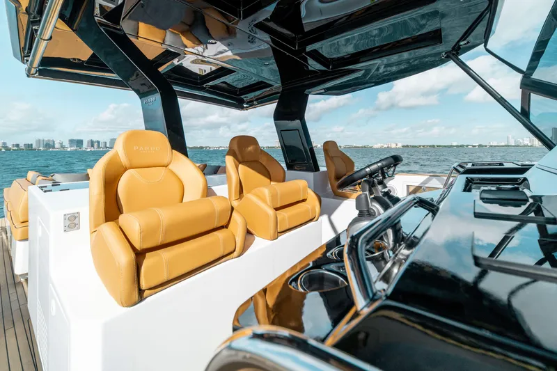 Slide: The Image of Luxurious 2023 Pardo Yachts 50 interior with tan leather seats and sleek dashboard. - 13