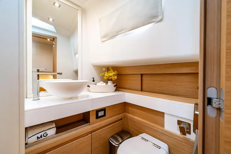 Slide: The Image of Luxurious bathroom interior of 2023 Pardo Yachts 50, featuring modern fixtures and wood accents. - 20