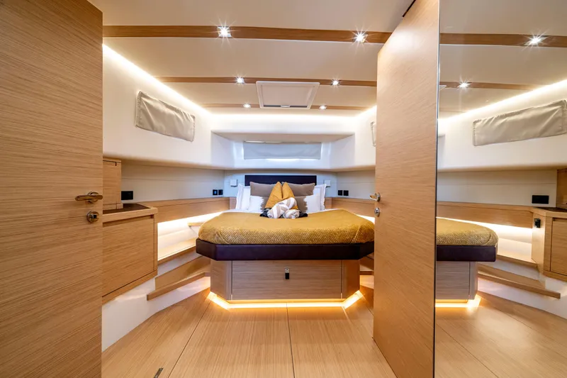 Slide: The Image of Luxurious interior of 2023 Pardo Yachts 50, featuring elegant wood finishes and ambient lighting. - 21