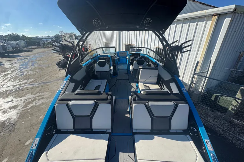Slide: The Image of 2022 Yamaha Boats 255XD interior view, showcasing sleek seating and modern design. - 12