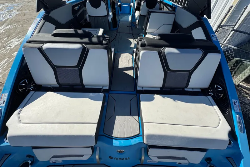 Slide: The Image of 2022 Yamaha Boats 255XD interior with stylish seating and modern design. - 14