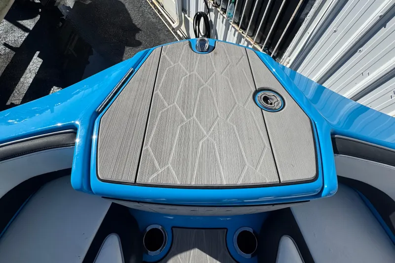 Slide: The Image of 2022 Yamaha Boats 255XD, blue deck with sleek design and modern features. - 40