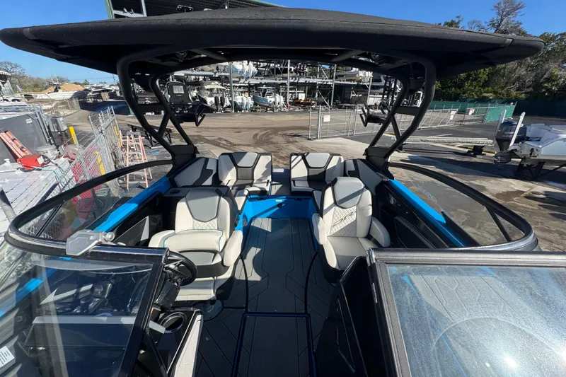 Slide: The Image of 2022 Yamaha Boats 255XD interior with sleek seating and modern design. - 45