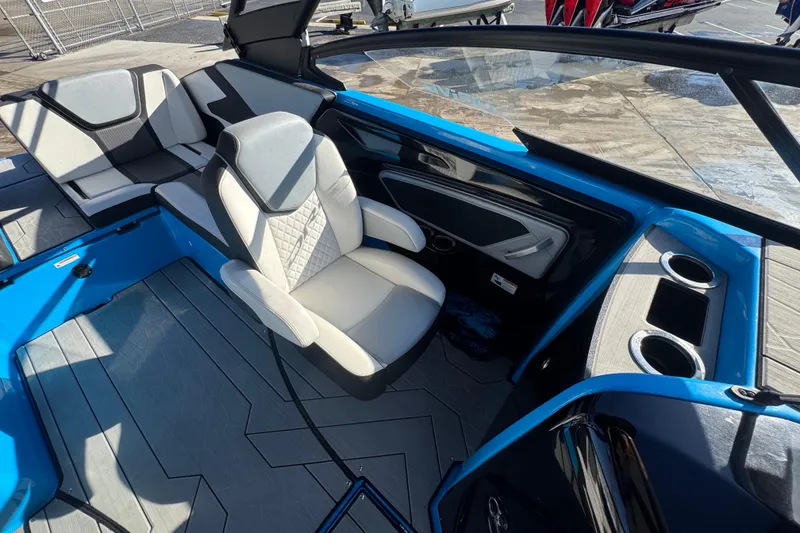 Slide: The Image of 2022 Yamaha Boats 255XD interior with modern seating and sleek design. - 48