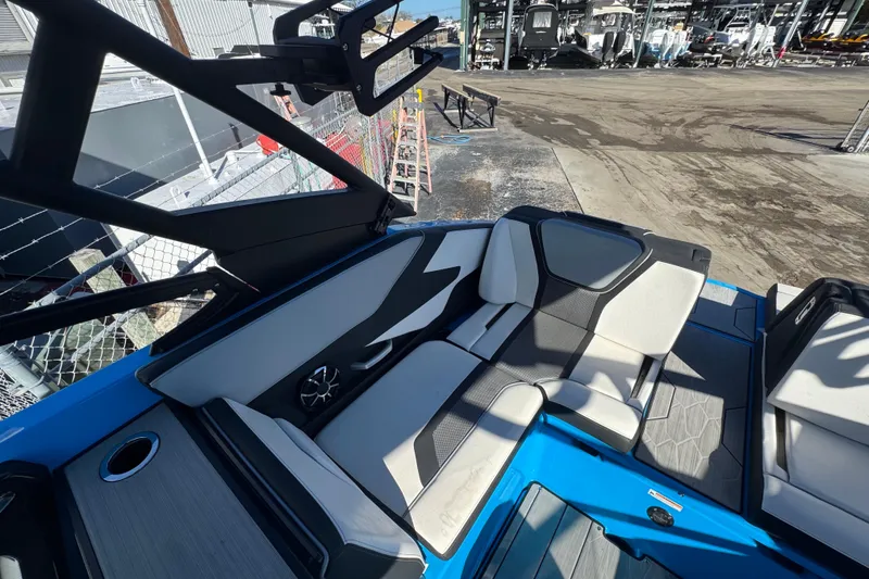 Slide: The Image of 2022 Yamaha Boats 255XD interior with sleek seating and modern design. - 51