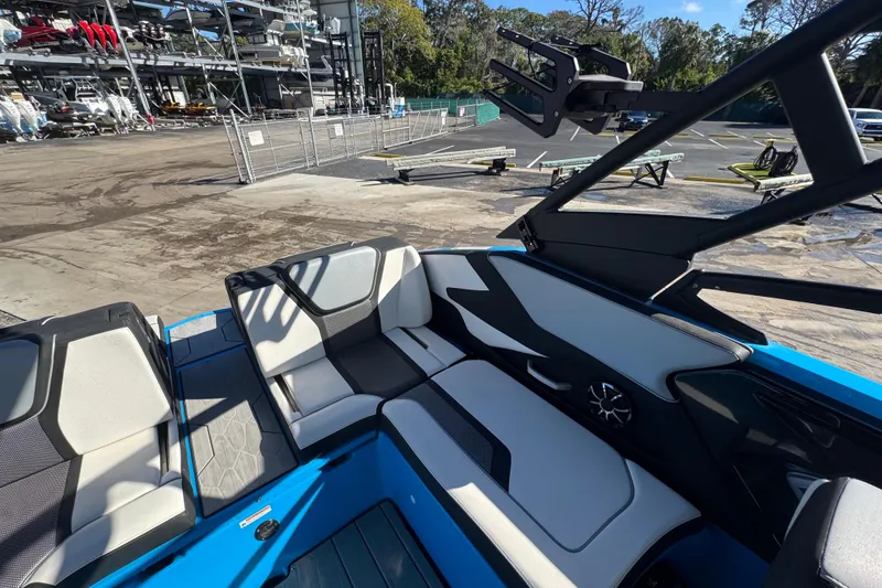 Slide: The Image of 2022 Yamaha Boats 255XD interior with sleek seating and modern design. - 53