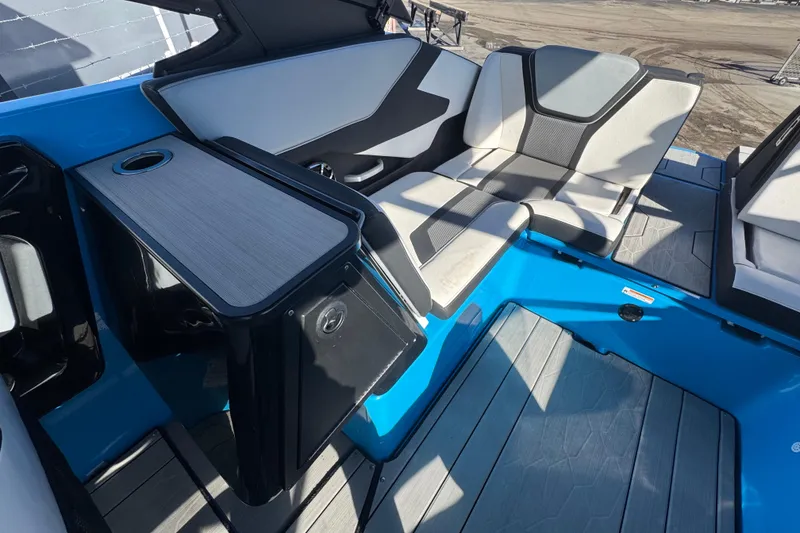 Slide: The Image of 2022 Yamaha Boats 255XD interior with sleek seating and modern design. - 55