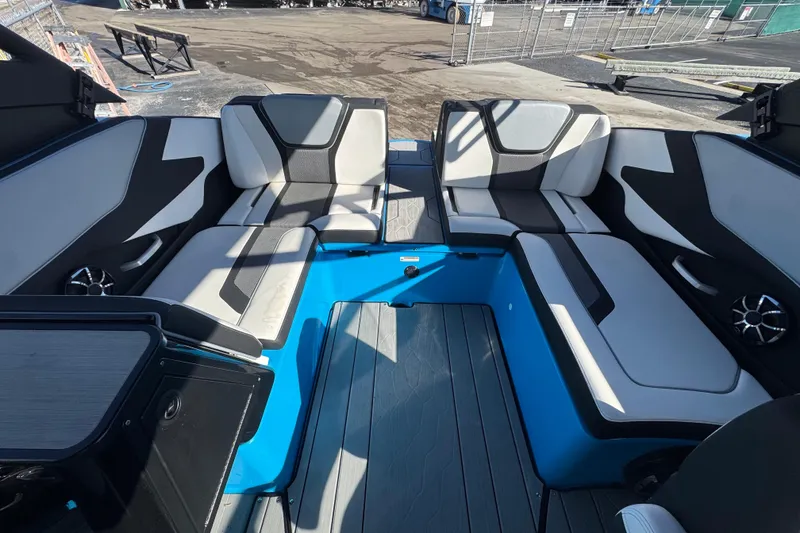 Slide: The Image of 2022 Yamaha Boats 255XD interior with modern seating and sleek design. - 58