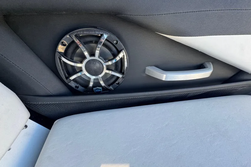 Slide: The Image of Speaker and handle detail in 2022 Yamaha Boats 255XD interior. - 61