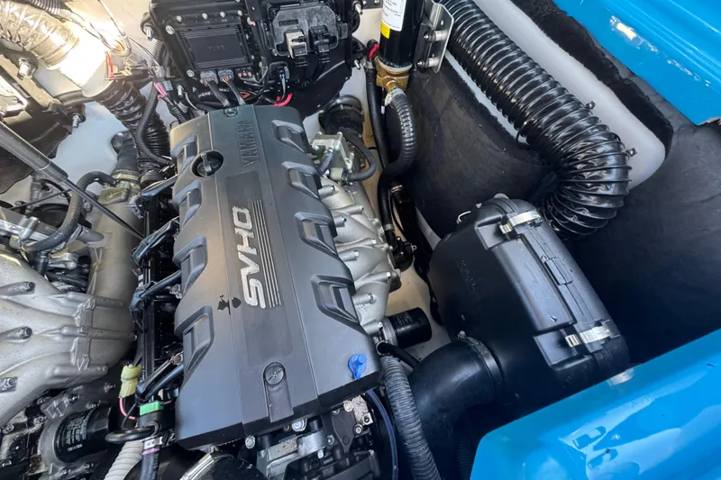 Slide: The Image of Engine compartment of 2022 Yamaha Boats 255XD, featuring a powerful SVHO engine. - 72