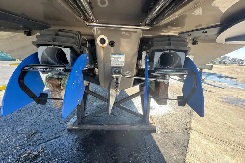 Slide: The Image of Rear view of 2022 Yamaha Boats 255XD jet propulsion system on a stand. - 9