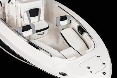 Slide: The Image of 2026 Robalo R200 Center Console boat interior with white and black seating. - 6