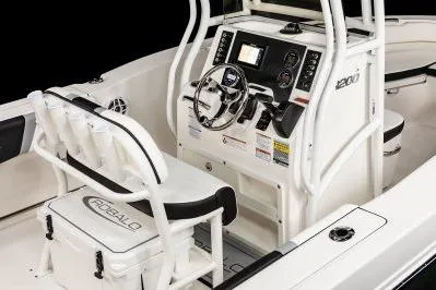 Slide: The Image of 2026 Robalo R200 Center Console boat interior with modern helm and seating. - 8