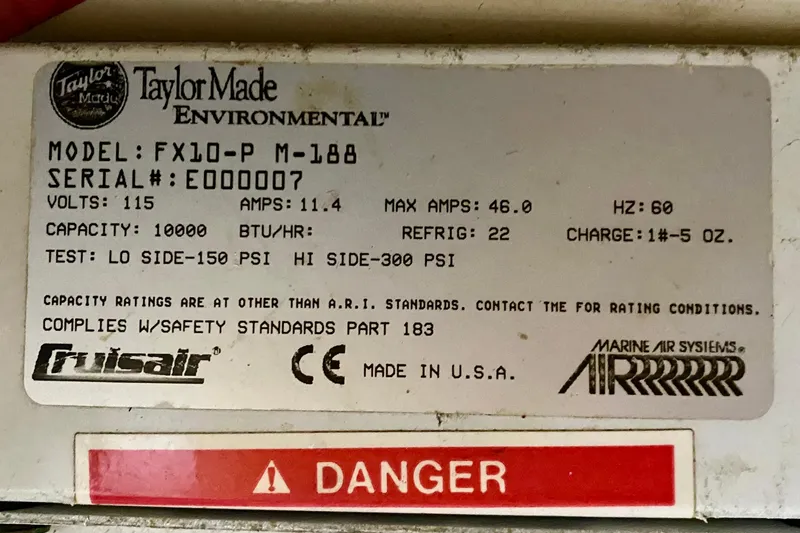 Slide: The Image of Label of Taylor Made Environmental model FX10-P M-188 with specifications and safety warning. - 121