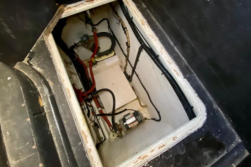 Slide: The Image of Engine compartment of a 2001 SportsCat 44, showing wiring and components. - 122