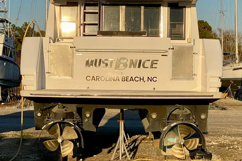 Slide: The Image of Rear view of 2001 SportsCat 44 boat, "Must B Nice," Carolina Beach, NC. - 127