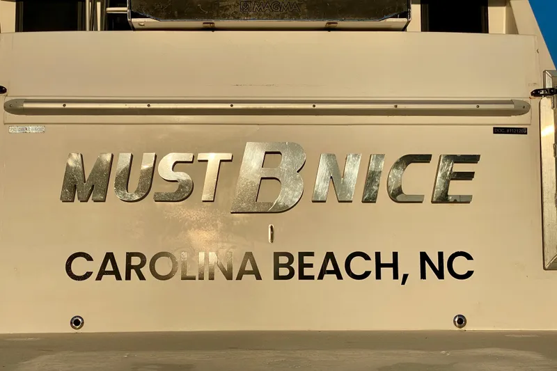 Slide: The Image of Boat named "Must B Nice" at Carolina Beach, NC, SportsCat 44, 2001 model. - 130