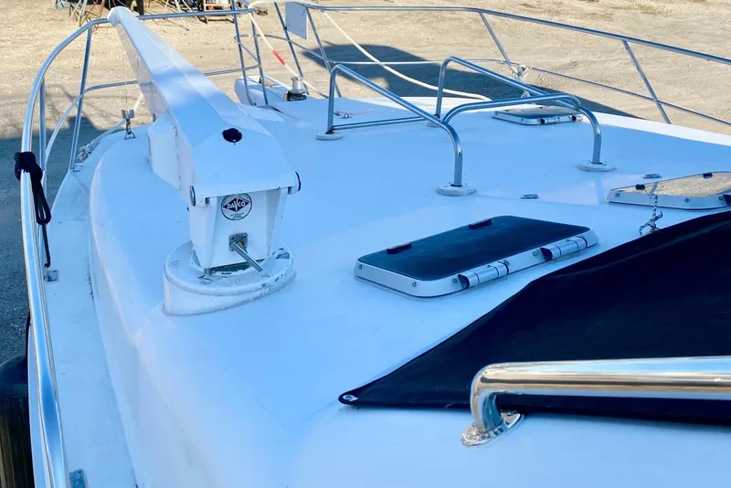 Slide: The Image of 2001 SportsCat 44 boat deck with anchor and hatch details. - 40