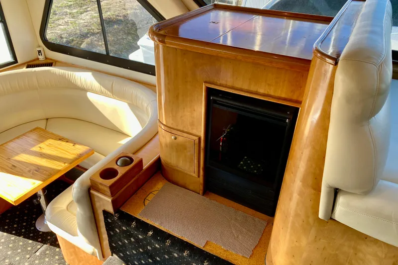 Slide: The Image of Luxurious 2001 SportsCat 44 interior with wood accents and cozy seating area. - 56
