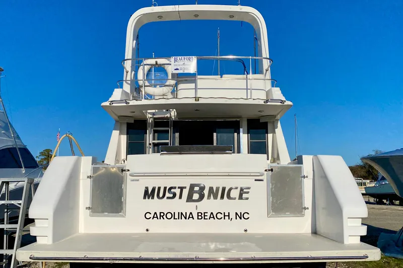 Slide: The Image of Rear view of 2001 SportsCat 44 boat named "Must B Nice" at Carolina Beach. - 6