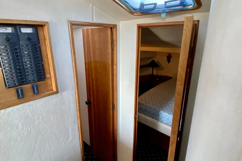 Slide: The Image of Interior of 2001 SportsCat 44 boat showing cabin and control panel. - 64