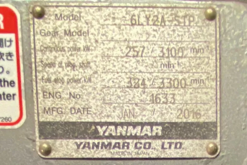 Slide: The Image of Plaque displaying Yanmar engine specifications and manufacturing details, dated January 2016. - 94