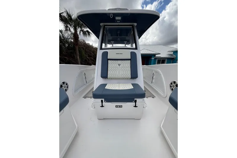 Slide: The Image of 2025 Twin Vee 260 GFX2 CC boat interior with cushioned seating and modern design. - 31