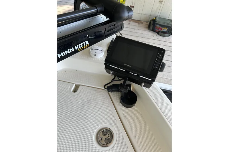 Slide: The Image of 2023 Skeeter SX210 boat with Garmin display and Minn Kota Ultrex trolling motor. - 17
