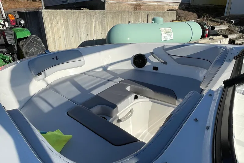 Slide: The Image of 2026 Bayliner VR4 Bowrider OB interior with spacious seating and modern design. - 14