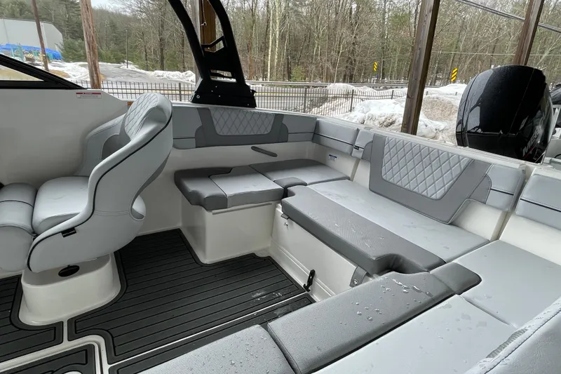 Slide: The Image of 2026 Bayliner VR4 Bowrider OB interior with gray seating and modern design. - 21