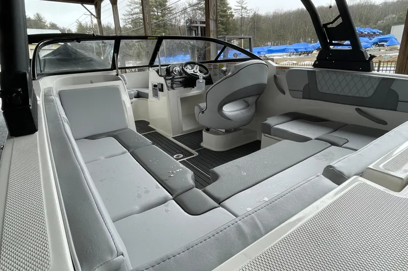 Slide: The Image of 2026 Bayliner VR4 Bowrider OB interior with sleek seating and modern dashboard design. - 22