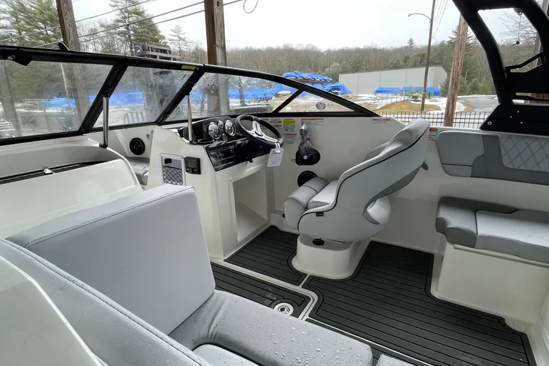 Slide: The Image of 2026 Bayliner VR4 Bowrider OB interior with modern seating and dashboard design. - 25