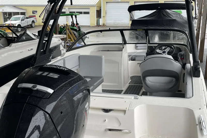 Slide: The Image of 2026 Bayliner VR4 Bowrider OB with Mercury 115 engine, interior view. - 7