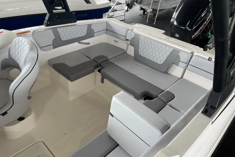 Slide: The Image of 2026 Bayliner VR4 Bowrider OB interior with gray seating and modern design. - 6