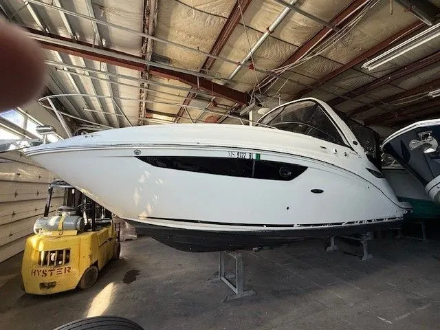Slide: The Image of 2016 Sea Ray 260 Sundancer in a storage facility. - 11