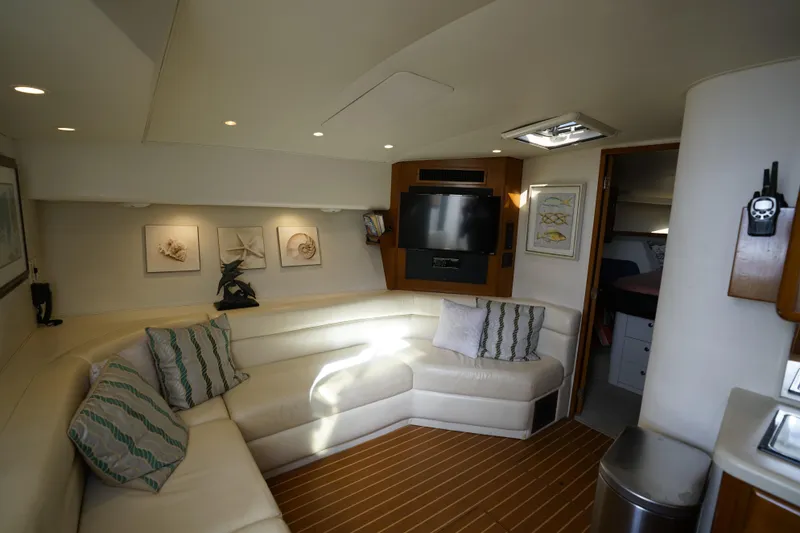 Slide: The Image of Luxurious interior of a 1998 Viking Open Express 43 yacht with elegant seating and decor. - 8