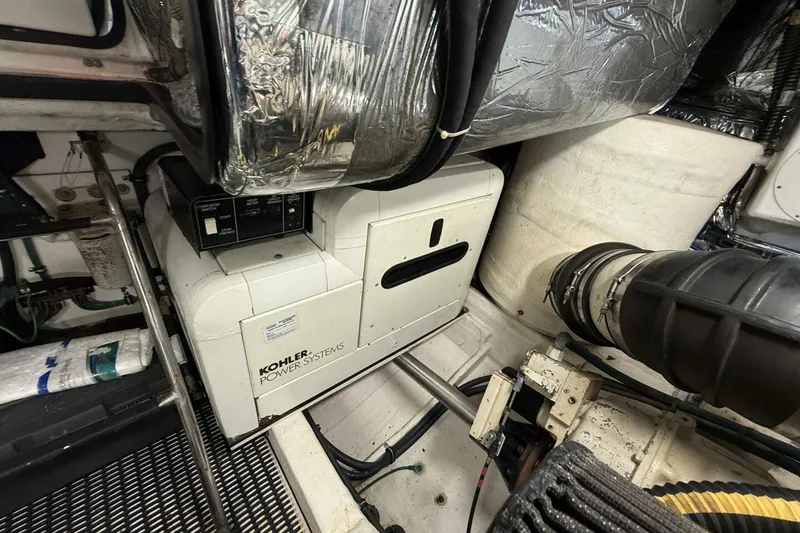 Slide: The Image of Engine room of 2004 Tiara Yachts 4200 Open with Kohler power system. - 16