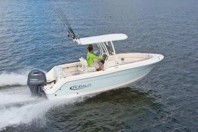 The Image of 2026 Robalo R222 Center Console boat cruising on open water. - 1